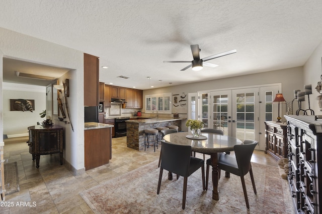 dining space featuring recessed lighting, a ceiling fan, visible vents, baseboards, and french doors