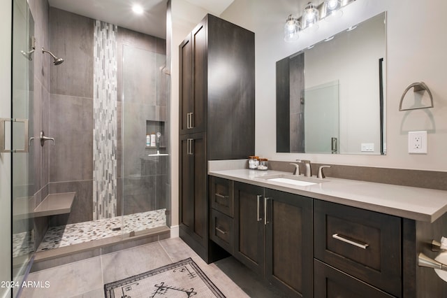 bathroom featuring vanity and walk in shower