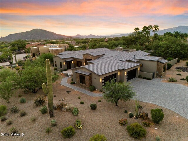 aerial view at dusk with a mountain view