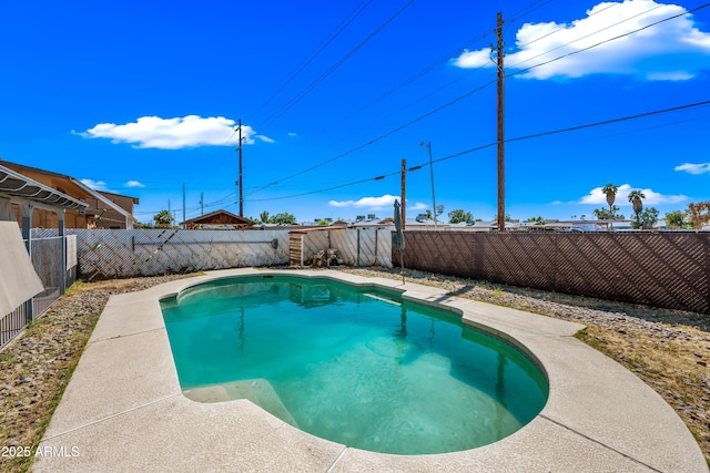 view of pool featuring a fenced backyard