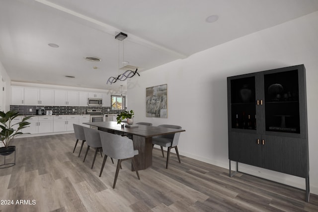 dining room featuring wood-type flooring