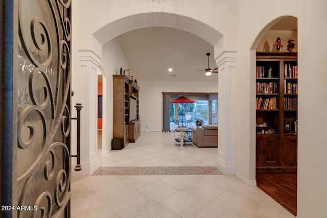 hallway featuring light tile patterned floors