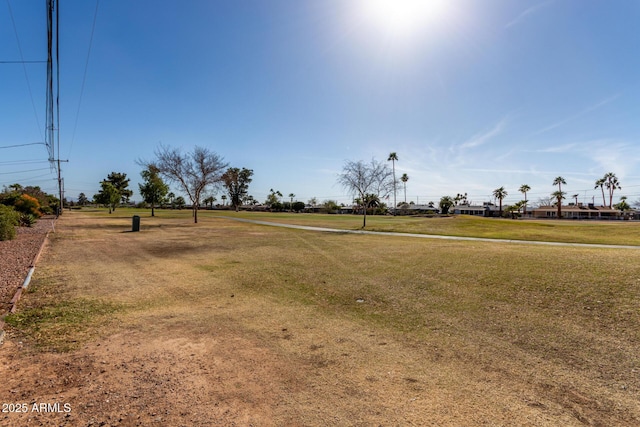 surrounding community featuring a lawn