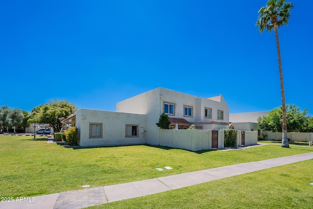 view of front of home featuring stucco siding