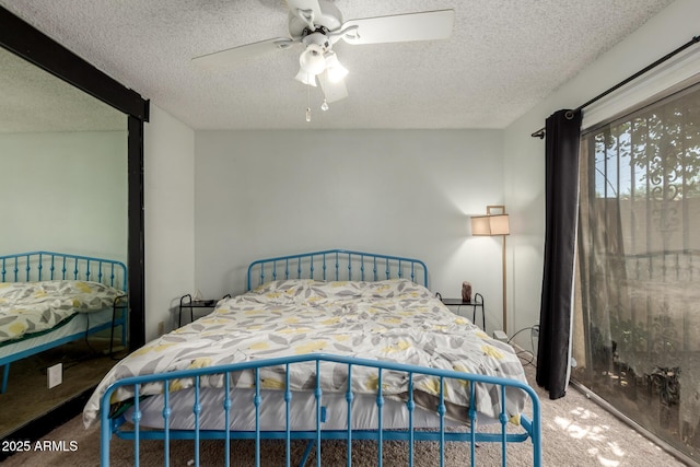 6207 N 21st Dr, Phoenix, AZ 85015 - bedroom with a textured ceiling, ceiling fan, and carpet floors