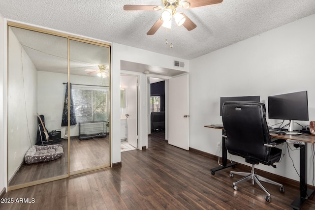 6207 N 21st Dr, Phoenix, AZ 85015 - office featuring a textured ceiling, visible vents, ceiling fan, and wood finished floors