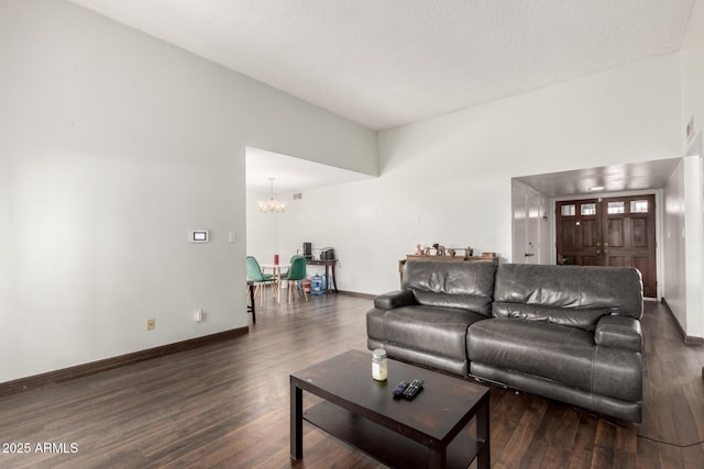 6207 N 21st Dr, Phoenix, AZ 85015 - living room with wood finished floors, a chandelier, and baseboards
