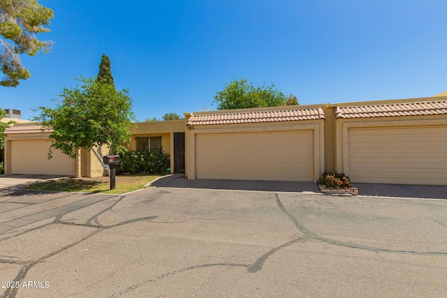 6207 N 21st Dr, Phoenix, AZ 85015 - view of front of house with stucco siding and a tiled roof
