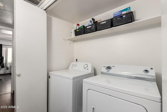 6207 N 21st Dr, Phoenix, AZ 85015 - clothes washing area featuring visible vents, washer and clothes dryer, and laundry area