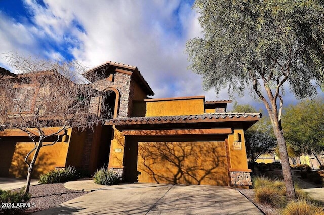 view of front of property featuring a garage