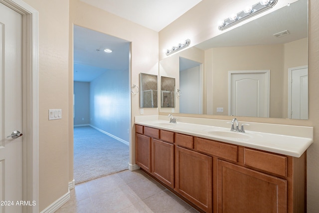 bathroom featuring vanity and tile patterned floors