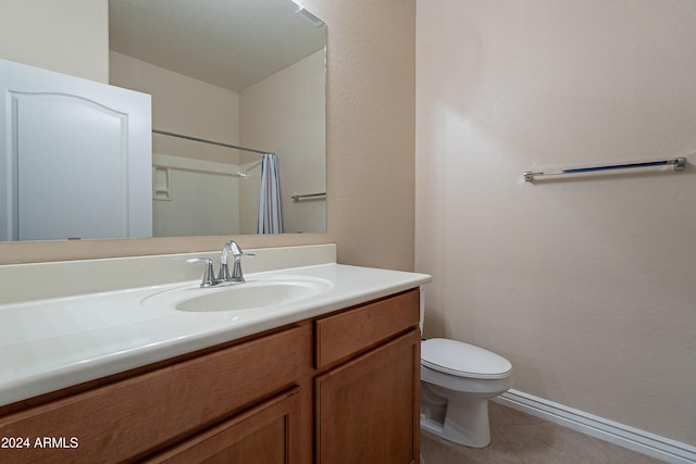 bathroom with tile patterned floors, vanity, toilet, and a shower with shower curtain