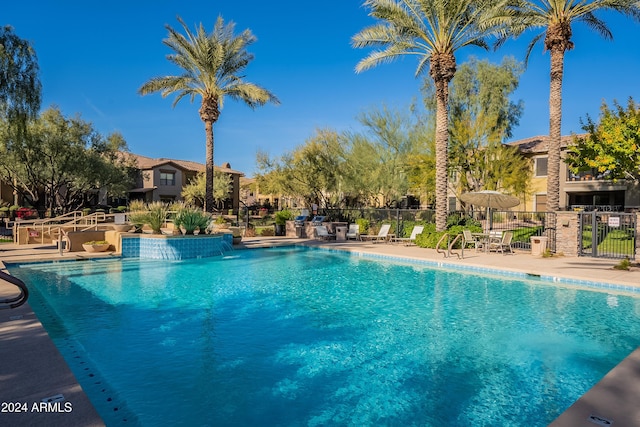 view of swimming pool featuring a patio