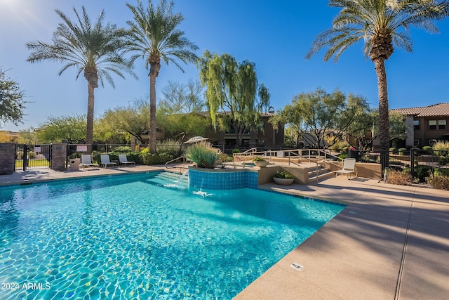 view of pool featuring a patio