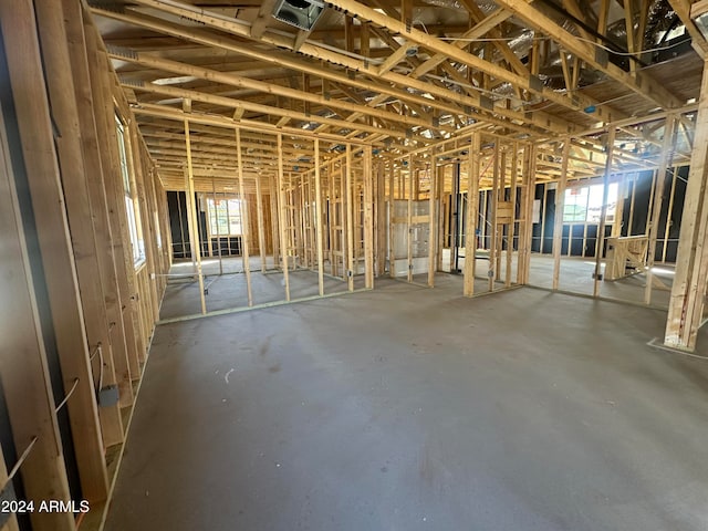 misc room featuring concrete floors and plenty of natural light