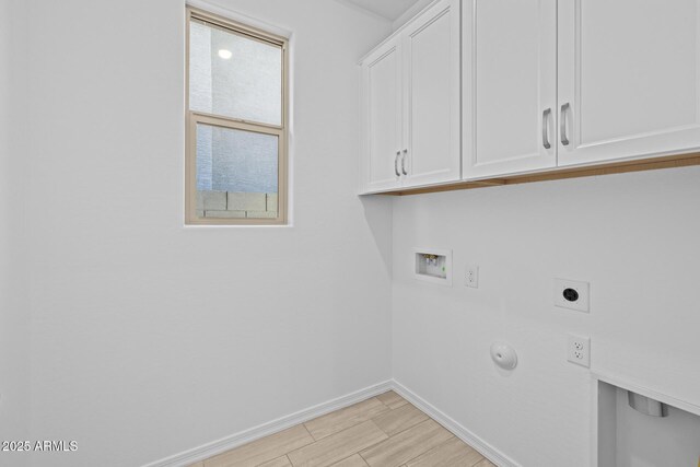 15788 W Georgia Dr W, Surprise, AZ 85379 - laundry room with hookup for an electric dryer, cabinet space, hookup for a washing machine, baseboards, and hookup for a gas dryer