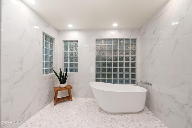 8219 S Pecan Grove Cir, Tempe, AZ 85284 - full bathroom with tile walls, a freestanding bath, and recessed lighting