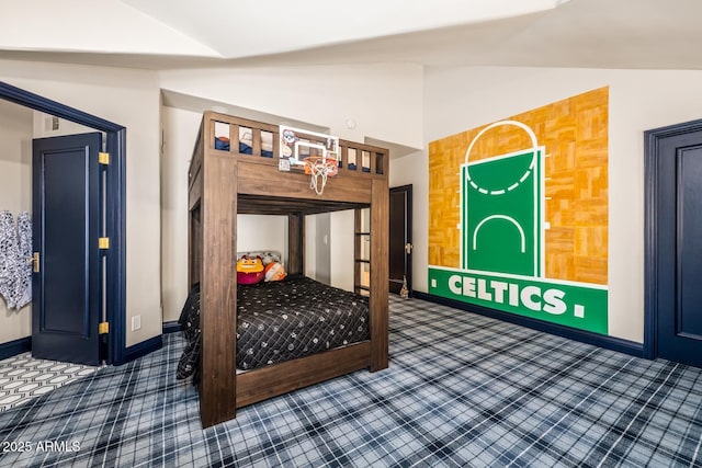 8219 S Pecan Grove Cir, Tempe, AZ 85284 - carpeted bedroom with lofted ceiling and baseboards