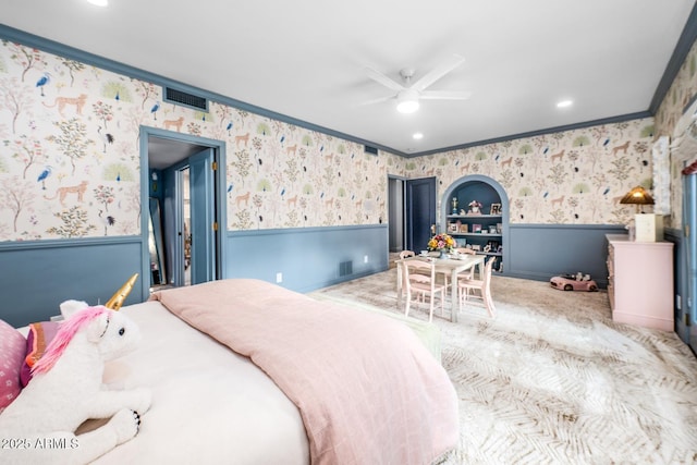 8219 S Pecan Grove Cir, Tempe, AZ 85284 - bedroom with wallpapered walls, a wainscoted wall, crown molding, carpet flooring, and a ceiling fan