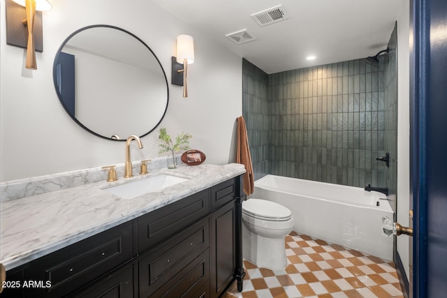 8219 S Pecan Grove Cir, Tempe, AZ 85284 - bathroom featuring toilet, vanity, tile patterned floors, and shower / washtub combination