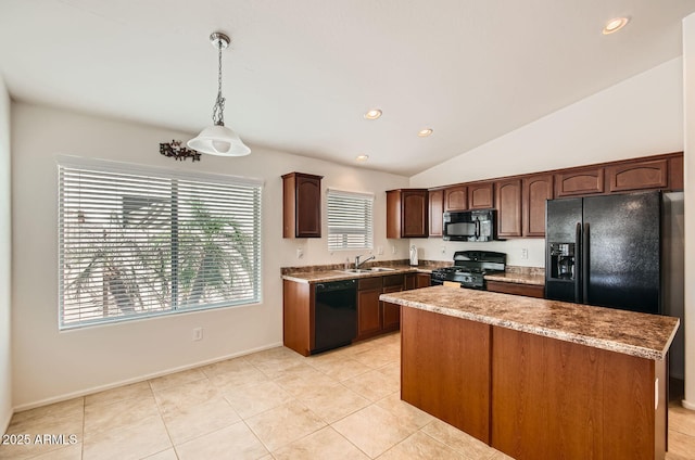 5502 N Ormondo Way, Litchfield Park, AZ 85340 - kitchen with black appliances, a sink, pendant lighting, recessed lighting, and a kitchen island