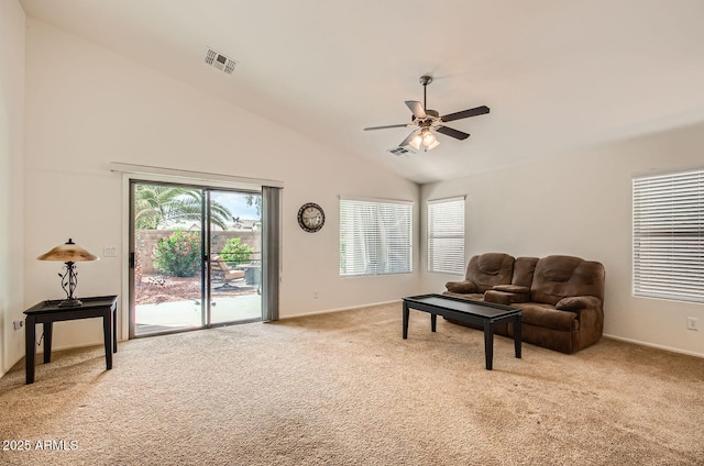 5502 N Ormondo Way, Litchfield Park, AZ 85340 - living room featuring light carpet, lofted ceiling, ceiling fan, and baseboards