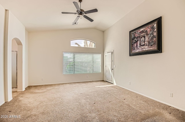 5502 N Ormondo Way, Litchfield Park, AZ 85340 - carpeted spare room featuring ceiling fan, arched walkways, vaulted ceiling, and baseboards