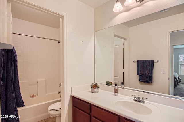 5502 N Ormondo Way, Litchfield Park, AZ 85340 - bathroom with toilet, vanity, bathtub / shower combination, and tile patterned floors