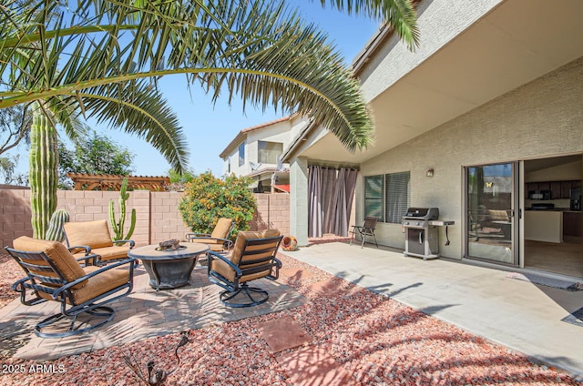5502 N Ormondo Way, Litchfield Park, AZ 85340 - view of patio / terrace featuring grilling area, an outdoor fire pit, and fence