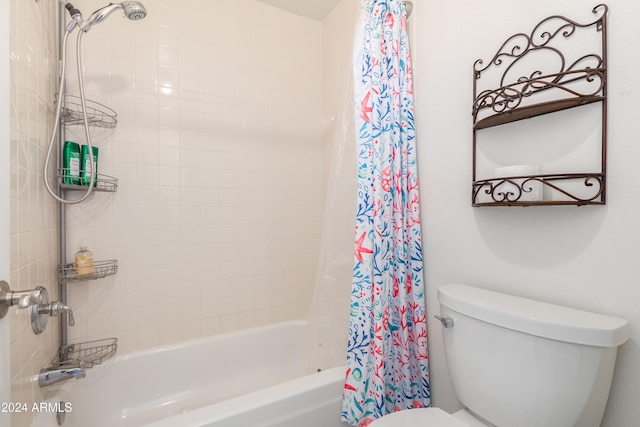 bathroom featuring toilet and shower / tub combo with curtain