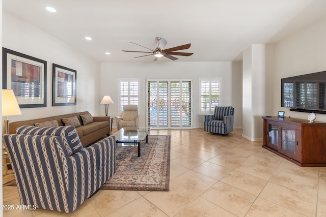 living room with recessed lighting, plenty of natural light, a ceiling fan, and tile patterned floors