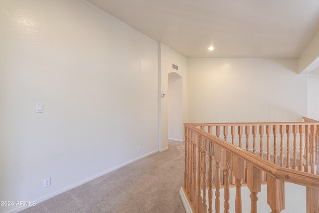 hallway featuring carpet floors