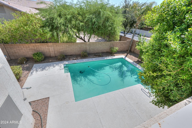 view of pool featuring a patio area