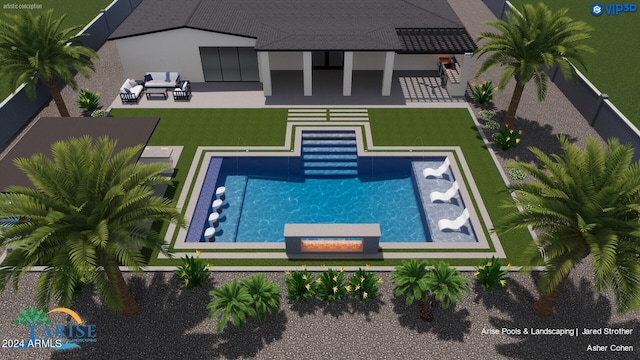 view of swimming pool featuring a yard