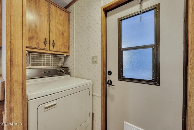 17124 E Fairway Dr, Mayer, AZ 86333 - washroom featuring washer / dryer, cabinet space, and wallpapered walls