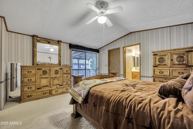 17124 E Fairway Dr, Mayer, AZ 86333 - bedroom with ornamental molding, a textured ceiling, wallpapered walls, lofted ceiling, and ensuite bath