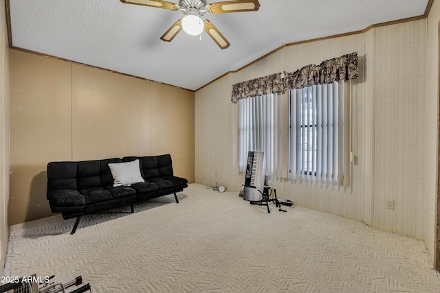 17124 E Fairway Dr, Mayer, AZ 86333 - living area featuring lofted ceiling, carpet floors, a ceiling fan, crown molding, and a textured ceiling