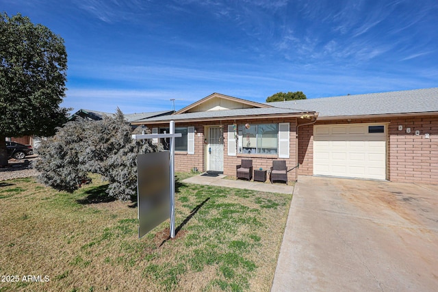 view of front of home with a garage, outdoor lounge area, and a front yard