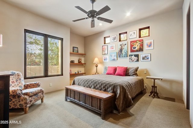 carpeted bedroom featuring ceiling fan