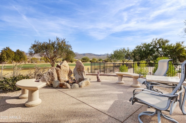 view of patio / terrace with a mountain view