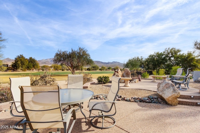 view of patio / terrace with a mountain view