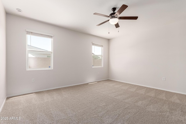 4713 W Nutmeg Ave, Coolidge, AZ 85128 - carpeted spare room featuring ceiling fan and baseboards