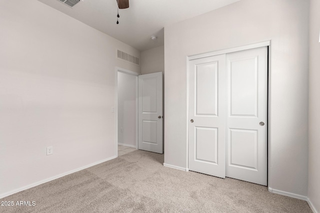 4713 W Nutmeg Ave, Coolidge, AZ 85128 - unfurnished bedroom with light carpet, a closet, and ceiling fan