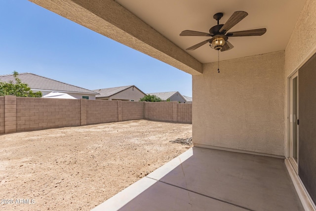 4713 W Nutmeg Ave, Coolidge, AZ 85128 - fenced backyard featuring a ceiling fan and a patio area