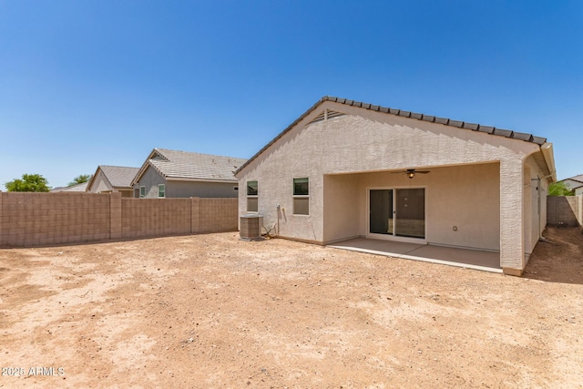 4713 W Nutmeg Ave, Coolidge, AZ 85128 - back of property featuring ceiling fan, a fenced backyard, stucco siding, and a patio area