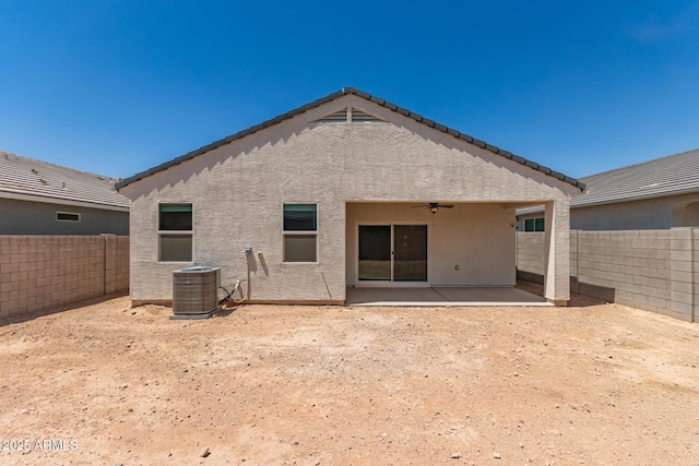 4713 W Nutmeg Ave, Coolidge, AZ 85128 - back of property featuring ceiling fan, stucco siding, a fenced backyard, and a patio area