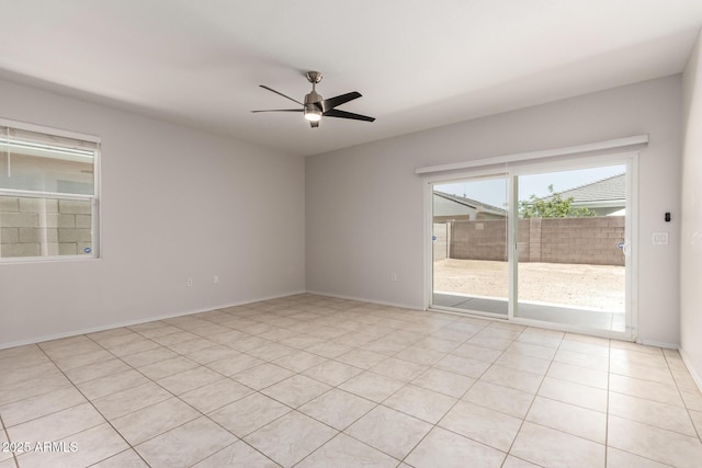 4713 W Nutmeg Ave, Coolidge, AZ 85128 - empty room with ceiling fan and light tile patterned flooring