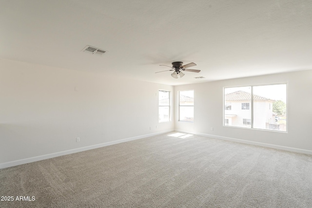 12813 W Paradise Dr, El Mirage, AZ 85335 - empty room featuring light carpet and a ceiling fan