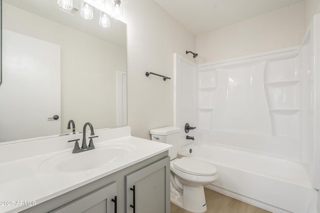 12813 W Paradise Dr, El Mirage, AZ 85335 - bathroom featuring vanity, shower / bathtub combination, and wood finished floors