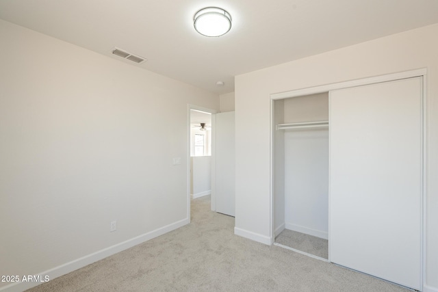 12813 W Paradise Dr, El Mirage, AZ 85335 - unfurnished bedroom featuring carpet and a closet